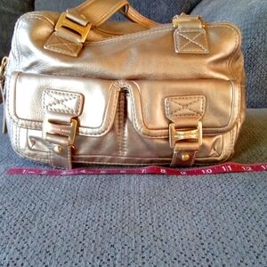 Michael Kors gold purse